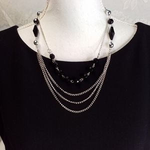 Four strand silver color chain with black faceted beads necklace